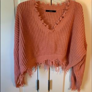 Distressed crop top sweater